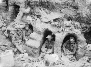 Border Regiment men in dugouts - Battle of the Somme August 1916 = commons.wikimedia.org